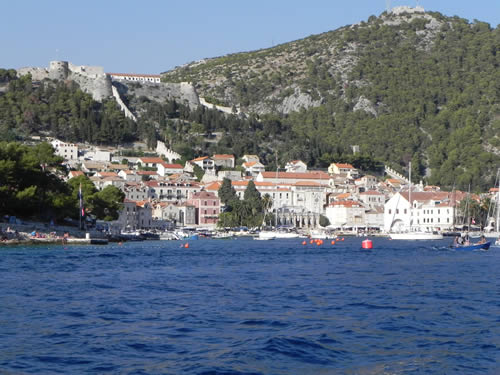 Approaching Hvar from the sea with Fortica and the Napolean fort above