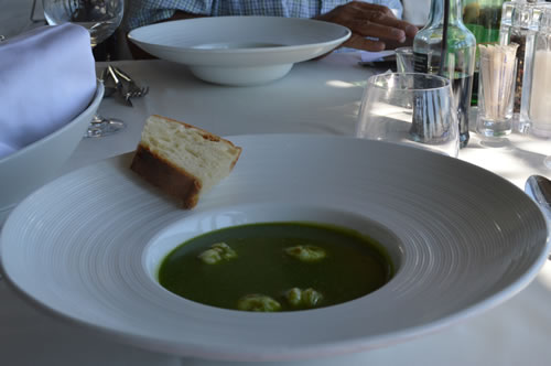 Soup of broccoli and scampi