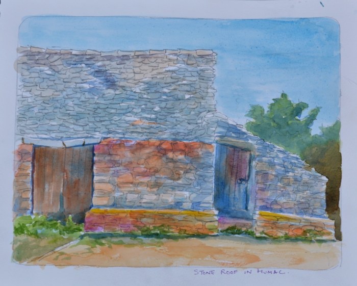 Cowshed with stone roof