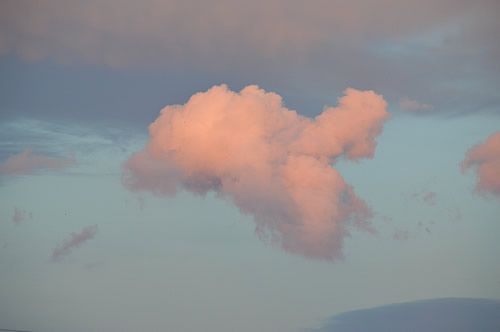 Single cloud at sunset