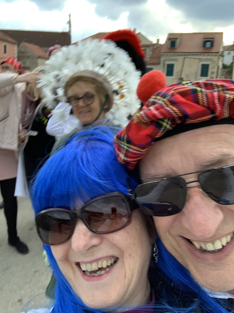 Selfie with large dandelion